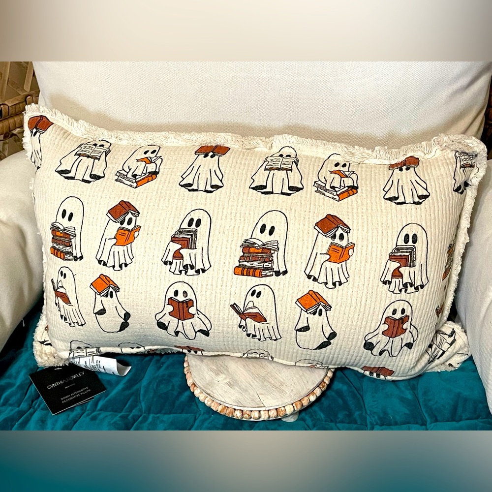 Ghost reading book pillow by Cynthia Rowley